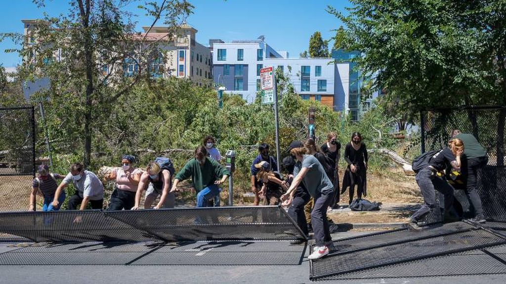 fences have been torn down by protesters